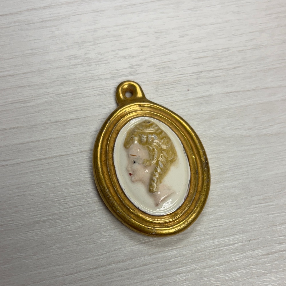 Elegant Gold Cameo Pendant